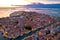 Town of Grado colorful architecture and archipelago aerial evening view