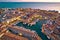 Town of Grado colorful architecture and waterfront aerial evening view
