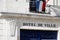 Town Hall sign in French means hotel de ville on city center text on entrance wall in fouras