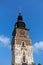 Town hall tower on main market square in cracow in poland on blue sky background