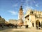 Town hall tower on main market square, many walking people