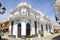 Town hall of the village of Trigueros in an old building of the city with the flags of Spain, Andalusia and Trigueros