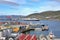 Town of Hammerfest with the downtown area, port, cruise ships & mountains in the background. Norway.