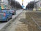 Town landscape on the streest with cars and tram rails.