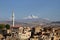 The town of Ortahisar in Cappadocia with Mount Erciyes in the background