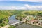 Town on the river bank and road bridge, top view. Road bridge on the island of Samar, Philippines