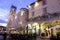 Town square of Assisi with the Torre del Popolo and fountain at night. The city of San Francesco with the lights of the night