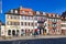 Town square called `Kornmarkt` in old historical city center of Heidelberg in Germany