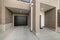 Townhouse garage exterior with smooth brown bricks