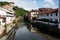 Townhouses on the banks and the old bridge over the river Nive, Saint-Jean-Pied-de-Port, France