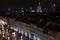 Townhouses on Illuminated Street in Warsaw, Poland at Night