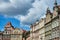 Townhouses in the Old Market Square and the tower of the Royal Castle