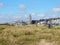 Townscape Katwijk aan Zee with Church, dwellings and dunes with grass