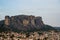 Townscape view of Kalambaka ancient town with beautiful rock formation mountain, immense natural boulders pillars and sky