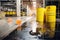 toxic chemical spill in a factory, with hazardous materials spilling onto the floor