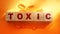 Toxic Word written on wooden cubes with Omega-3 pills around. Detoxication healthcare concept