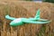 Toy airplane,baby toy airplane with Styrofoam on a beveled wheat field