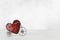 Toy bike carrying big red heart. Valentines day minimalism background