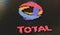 Toy bricks compose logo of TOTAL. Editorial conceptual 3d rendering