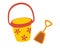 Toy bucket with a dustpan. Beach games. Summer vacation. Set of buckets and dustpan for playing in the sandbox for children.