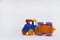 Toy cars collided in an accident on a white background Crash on a toy road