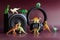 Toy dinosaurs next to an audio speaker and headphones. The concept of children`s audio tales and educational audio materials on