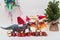 Toy dinosaurs with Santa Claus hats singing christmas carols