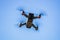 Toy drone blue sky background