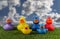 Toy ducks and blue sky