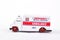Toy emergency ambulance, white background.