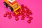 Toy excavator raking hearts. Pink background. Children`s love game