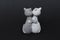 Toy, figurine - white and gray cats are standing in an embrace