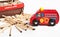 Toy fire truck next to scattered matches
