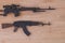 Toy gun Model guns figure on wood background