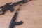 Toy gun Model guns figure on wood background