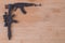 Toy gun Model guns figure on wood background for write board