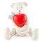 Toy handmade teddy bear with heart