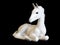 Toy horse made of ceramic isolated on black background