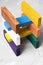 Toy house of colorful wooden blocs, vertical image. Nobody