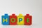 Toy letter blocks that spell HOPE