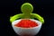 Toy man with bowl red caviar