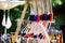 Toy medieval armour, helmets and weapons sold on market stall during annual Medieval Festival, held in Trakai Peninsular Castle