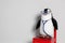 Toy penguin with eyeglasses and stethoscope on white background, space for text. Pediatrician practice