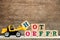 Toy plastic bulldozer hold letter block H to word hot offer