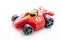Toy plastic formule car on white