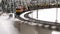 Toy platform with tractors and fuel tanks in winter . Slow motion. 3840x2160