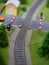 Toy railway. Moved over with barriers. Selective focus, veritical photo