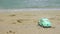 Toy retro car at the beach