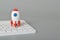 Toy rocket and laptop keyboard isolated on a grey background.The symbol for success is Start-up, business, education and knowledge