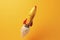 Toy rocket takes spewing smoke on a yellow background the symbol for success is startup education and knowledge. Generative AI